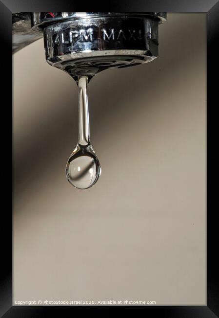 Water dripping from a tap Framed Print by PhotoStock Israel
