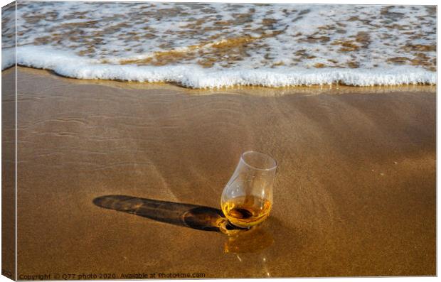 a glass of whiskey single malt on the sand washed by the waves, a glass of tasting, relax on the beach Canvas Print by Q77 photo