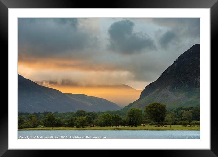 Stunning epic sunrise landscape image looking along Loweswater towards wonderful light on Grasmoor and Mellbreak mountains in Lkae District Framed Mounted Print by Matthew Gibson