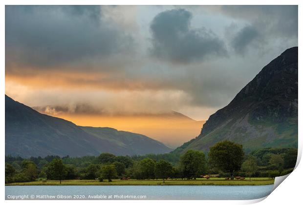 Stunning epic sunrise landscape image looking along Loweswater towards wonderful light on Grasmoor and Mellbreak mountains in Lkae District Print by Matthew Gibson