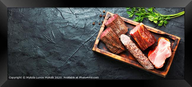 Chopping board of cured meat Framed Print by Mykola Lunov Mykola