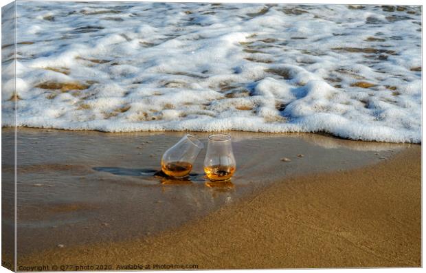 two glasses of whiskey single malt on the sand washed by the waves, a glass of tasting, relax on the beach Canvas Print by Q77 photo