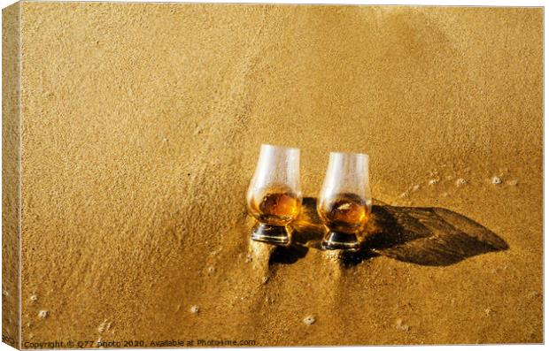 two glasses of whiskey single malt on the sand washed by the waves, a glass of tasting, relax on the beach Canvas Print by Q77 photo