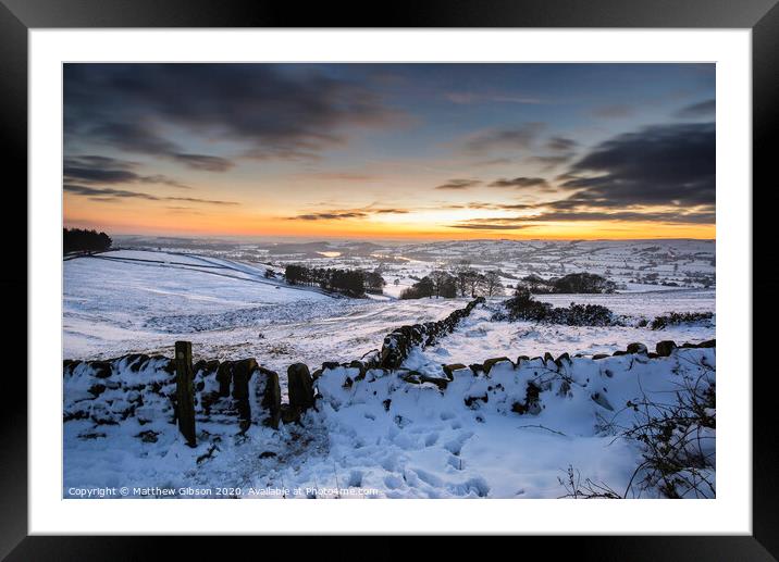Stunning Winter sunset over snow covered Winter landscape in Peak District Framed Mounted Print by Matthew Gibson