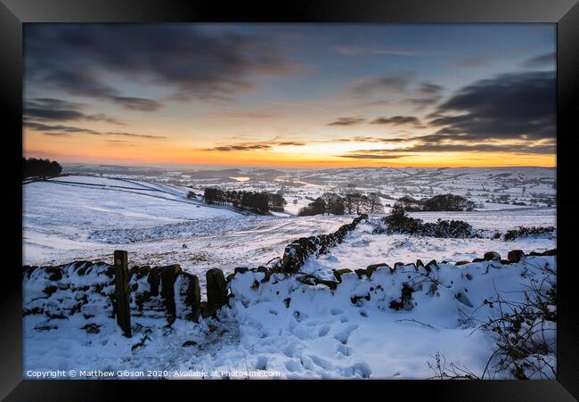 Stunning Winter sunset over snow covered Winter landscape in Peak District Framed Print by Matthew Gibson