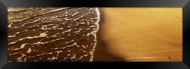 close up of the sea water affecting the sand on the beach, sea waves calmly flowing sand, relaxing view Framed Print by Q77 photo