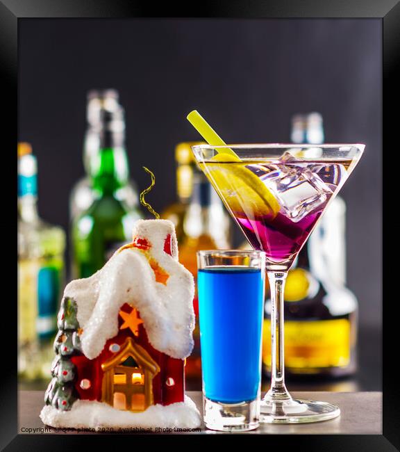 Coctail and beautiful Christmas house, candle, bottle background, xmas set Framed Print by Q77 photo