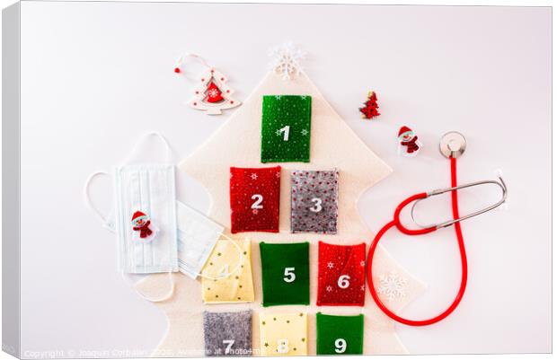 Traditional advent calendar protected with medical face masks, isolated on white background. Canvas Print by Joaquin Corbalan