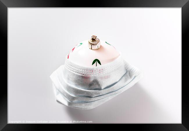Christmas decoration isolated on white background with masks to avoid virus infections. Framed Print by Joaquin Corbalan