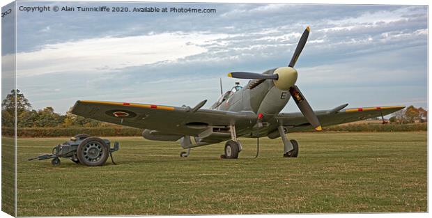 Majestic Spitfire on the Ground Canvas Print by Alan Tunnicliffe