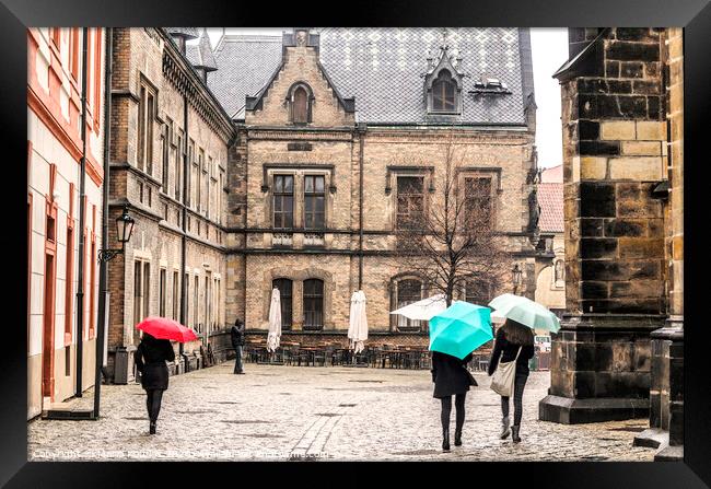 umbrella day in the streets of prague Framed Print by Mario Koufios