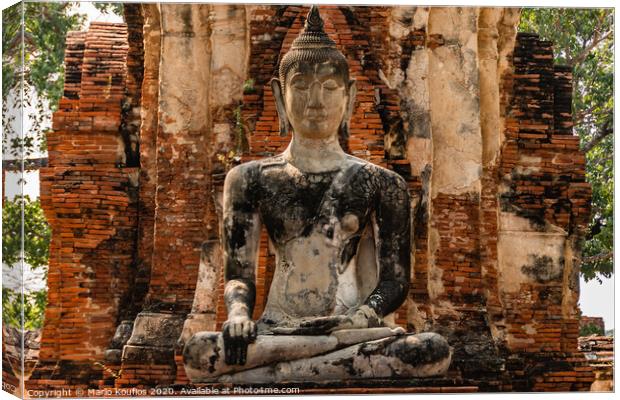 Close-up of a buddha in ruined temple Ayutthaya Thailand Canvas Print by Mario Koufios