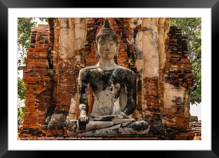 Close-up of a buddha in ruined temple Ayutthaya Thailand Framed Mounted Print by Mario Koufios