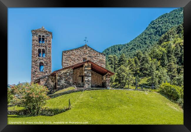 Hilltop and stone church facade in the Pyrenees. Andorra Europe Framed Print by Mario Koufios