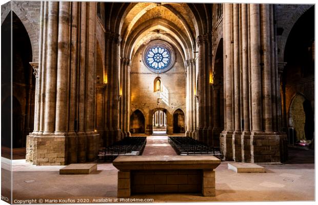 Altar and main nave of the old Cathedral of Lleida. Catalonia Spain Canvas Print by Mario Koufios