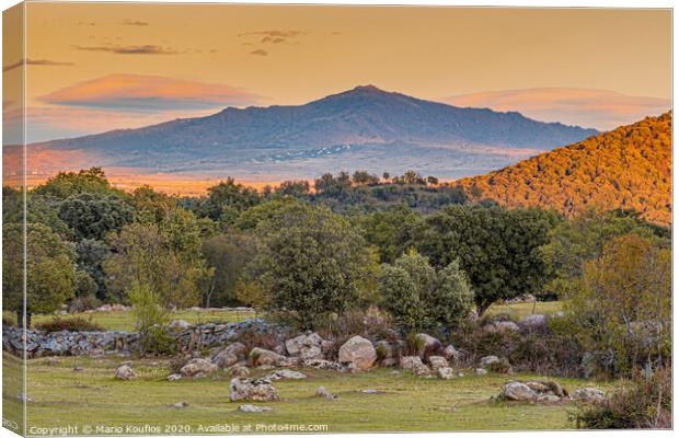 Sunset over the mountains of the Sierra de Guadarrama. madrid Spain. Canvas Print by Mario Koufios