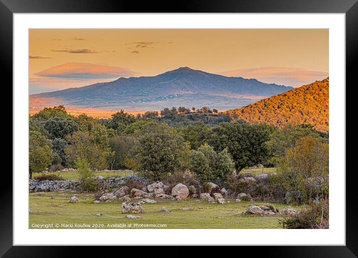 Sunset over the mountains of the Sierra de Guadarrama. madrid Spain. Framed Mounted Print by Mario Koufios
