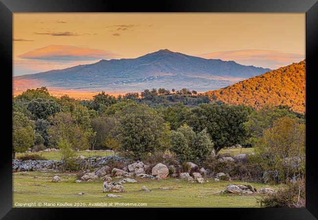 Sunset over the mountains of the Sierra de Guadarrama. madrid Spain. Framed Print by Mario Koufios