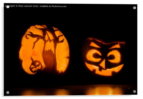 Two intricately carved halloween pumpkins lit by candle tea lights Acrylic by Rhys Leonard