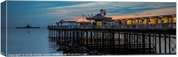 Herne Bay pier at dusk Canvas Print by Ernie Jordan