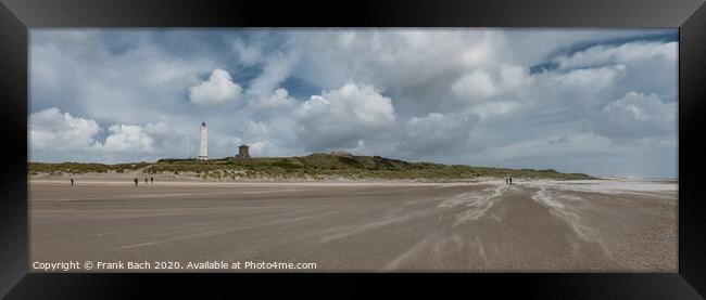 Blaavand beach lighthouse at the North sea coast on a windy day, Denmark Framed Print by Frank Bach