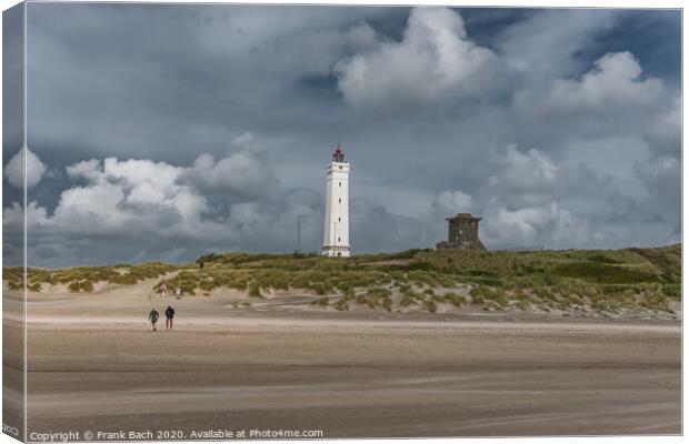 Blaavand beach lighthouse at the North sea coast on a windy day, Denmark Canvas Print by Frank Bach