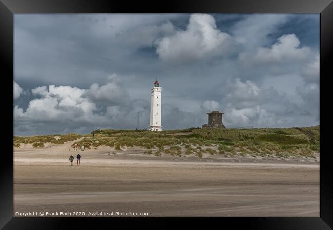 Blaavand beach lighthouse at the North sea coast on a windy day, Denmark Framed Print by Frank Bach
