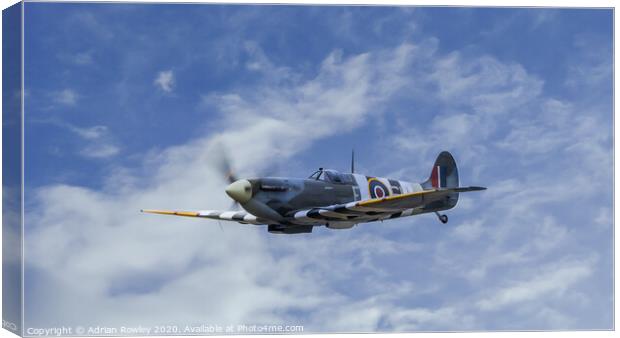 Spitfire in D-Day Colours Canvas Print by Adrian Rowley