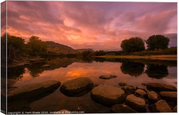 Sunset on the river Canvas Print by Terri Steele