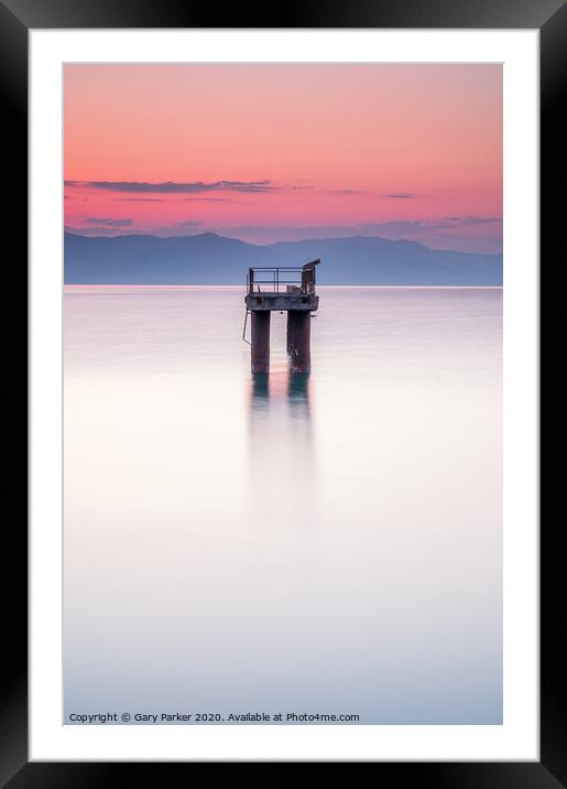 Solitary structure in a calm sea Framed Mounted Print by Gary Parker