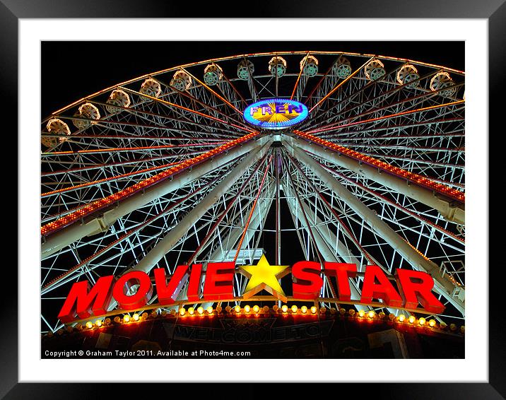 Colourful Nightscape of Ferris Wheel in Global Vil Framed Mounted Print by Graham Taylor