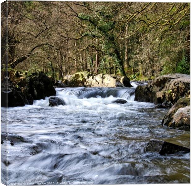 A view up the river at Bewts y Coed, Wales Canvas Print by Simon Marlow