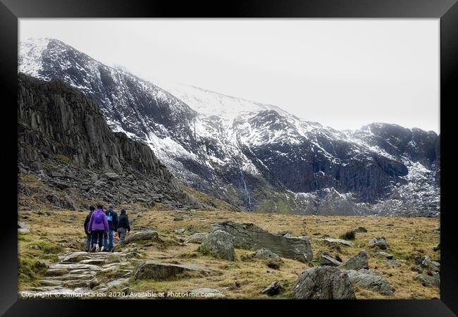 Hiking at Llyn Idwal in Snowdonia National Park, W Framed Print by Simon Marlow