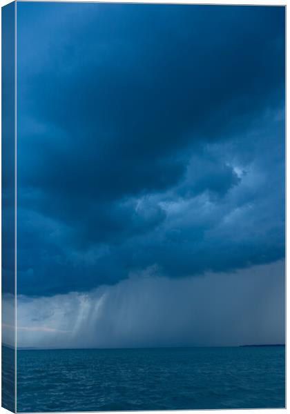 Big powerful storm clouds over the Lake Balaton of Hungary, typical summer shower Canvas Print by Arpad Radoczy