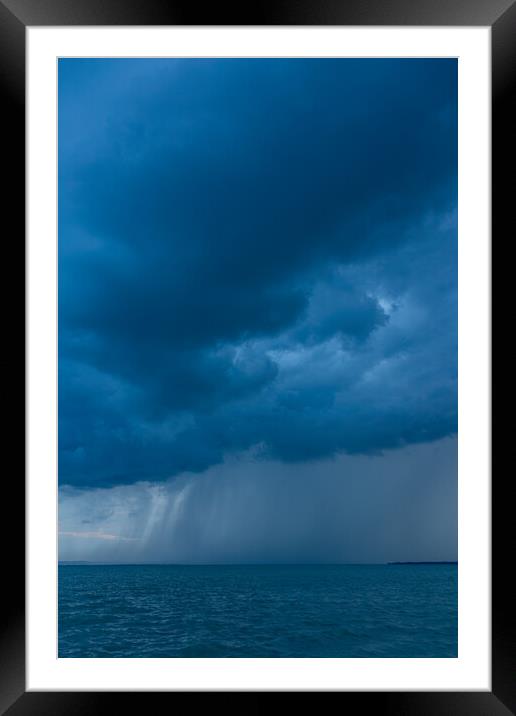 Big powerful storm clouds over the Lake Balaton of Hungary, typical summer shower Framed Mounted Print by Arpad Radoczy