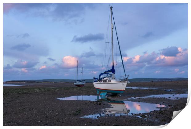 yachts moored on Instow beach at dusk Print by Tony Twyman