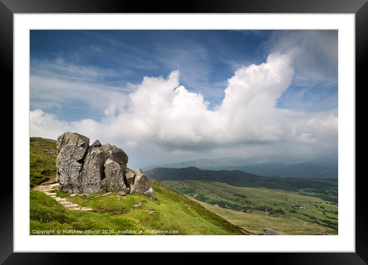 Landscape view from Cadair Idris looking North towards Dolgellau over fields and countryside on sunny day Framed Mounted Print by Matthew Gibson