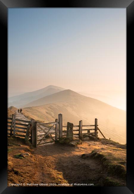 Stunning Winter sunrise landscape image of The Great Ridge in the Peak District in England with a cloud inversion and mist in the Hope Valley with a lovely orange glow Framed Print by Matthew Gibson