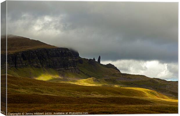 Old Man of Storr poking out of the landscape Canvas Print by Jenny Hibbert