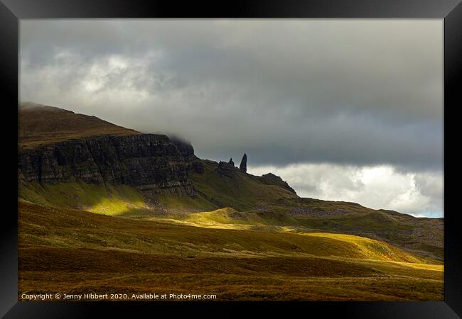 Old Man of Storr poking out of the landscape Framed Print by Jenny Hibbert