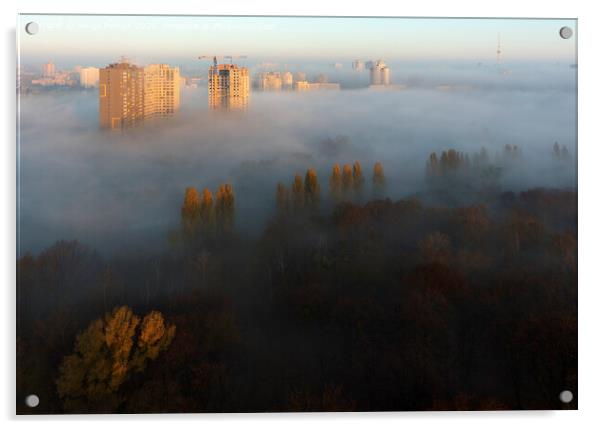 The sun's rays illuminate the morning city through the dense autumn fog Acrylic by Sergii Petruk