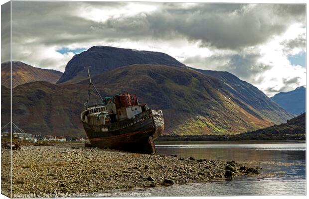 Ben Nevis over looking Corpach and abandoned old boat Canvas Print by Jenny Hibbert