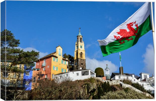 Welsh flag flying at Portmeirion village Canvas Print by Tim Snow