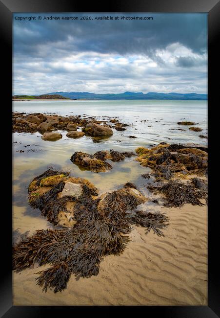 Shoreline at Criccieth beach, North Wales Framed Print by Andrew Kearton