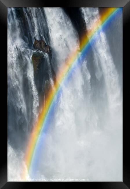 Rainbow amongst the mist, spray and cascading water of Victoria Falls, Africa Framed Print by Mehul Patel