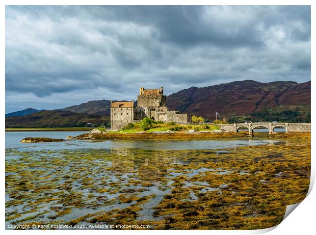 A body of water with Eilean Donan in the background Print by Karol Kozlowski