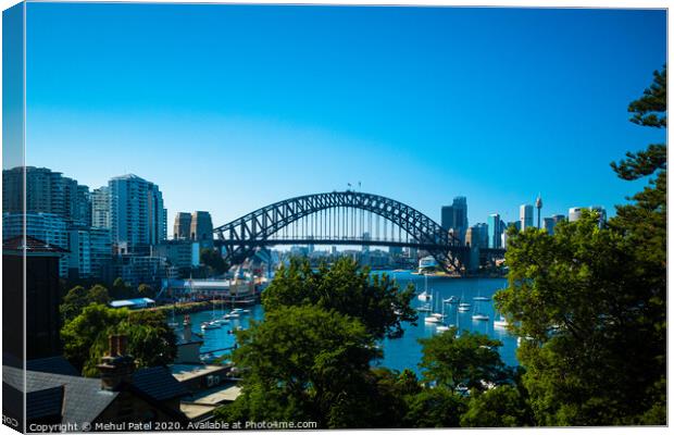 Sydney Harbour cityscape with Harbour Bridge and Central Business District in the distance, Sydney, New South Wales, Australia Canvas Print by Mehul Patel