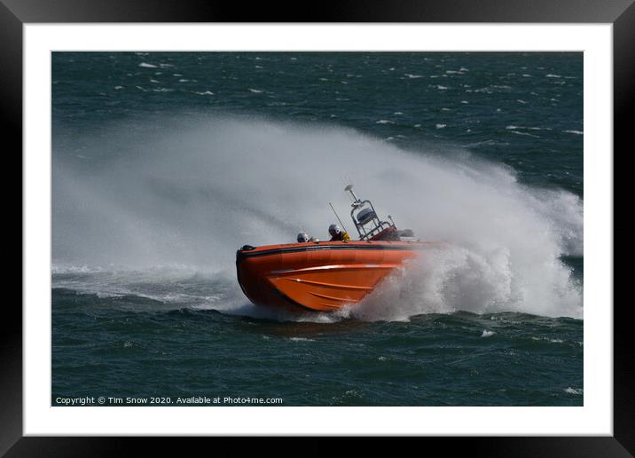 Beaumaris lifeboat with big spray Framed Mounted Print by Tim Snow
