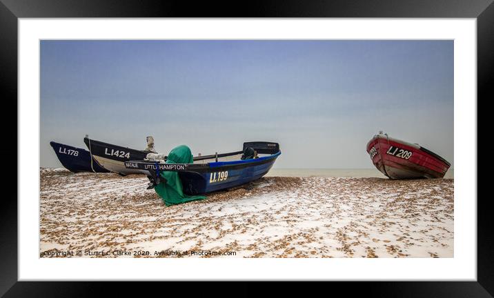 Fishing boats in the snow Framed Mounted Print by Stuart C Clarke