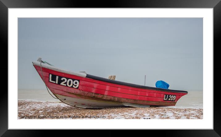 Red fishing boat in the snow Framed Mounted Print by Stuart C Clarke